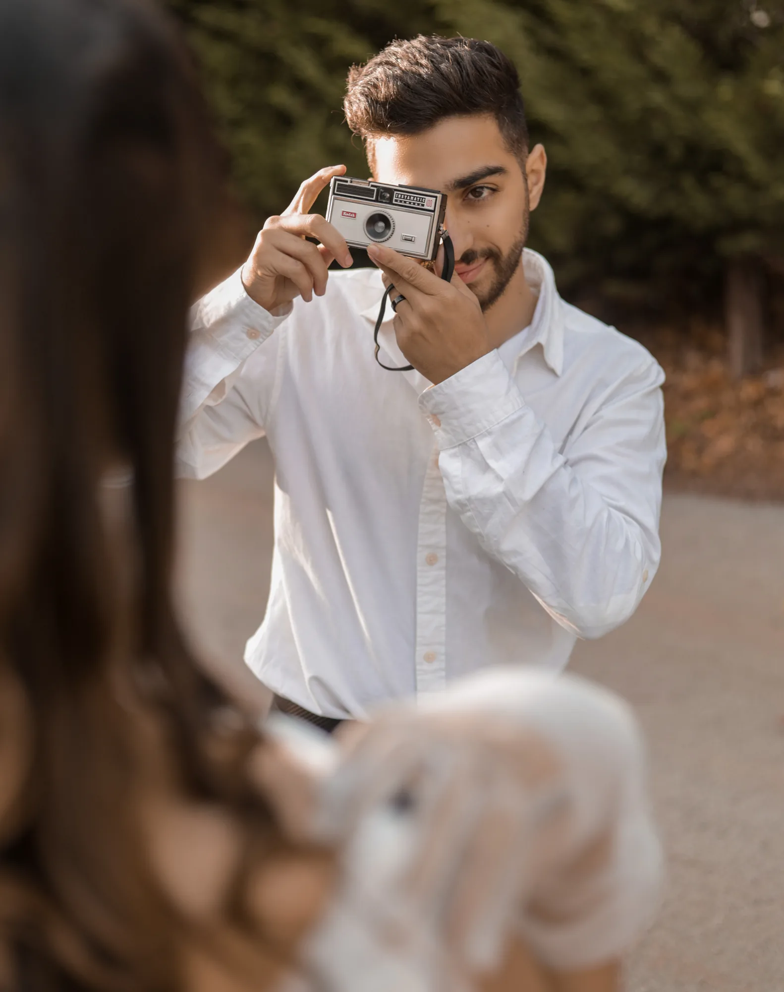 Hady Daaboul photographing a couple on a vintage film camera